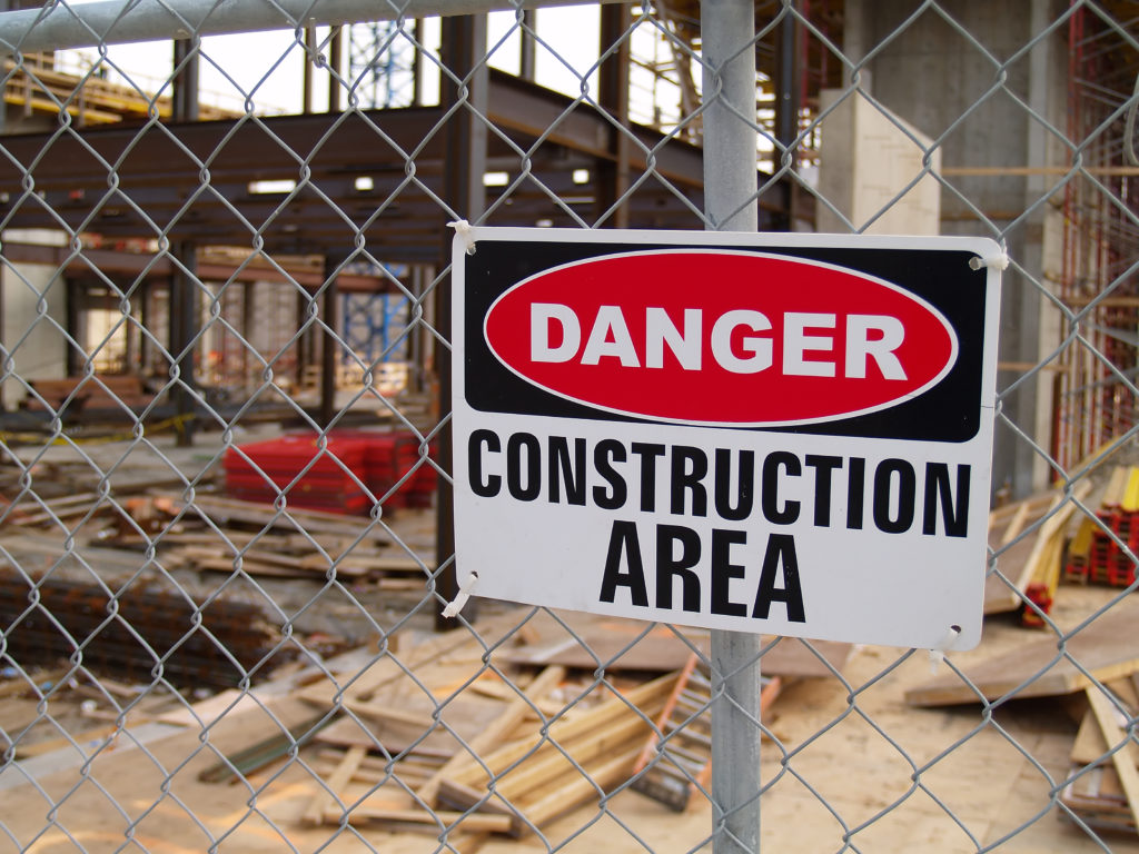 Sign informing people of the danger in the construction site