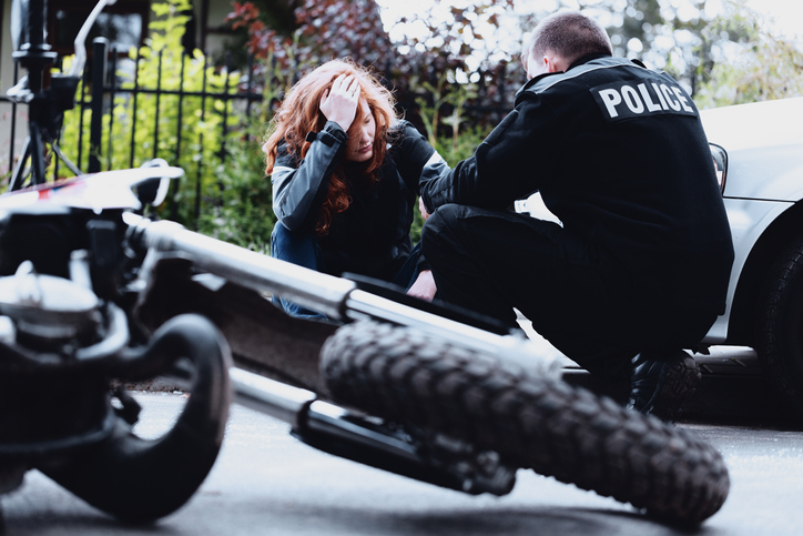 tragedy of motorcycle accidents police interviewing cyclist